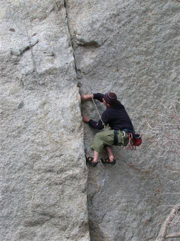 Tim makes good use of the crack as he pulls the crux. No prophylactics required.