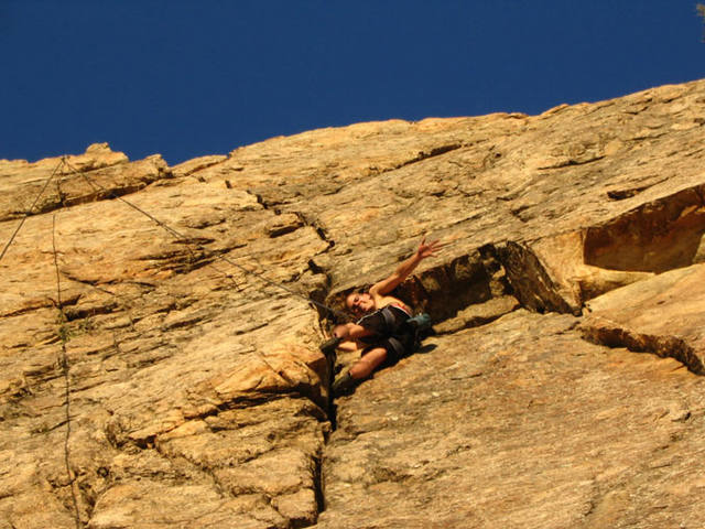 Wedged under the overhang. One of the funnest climbs I've done. I don't have any of my own anchor equipment so had to toprope off of Flakes (to the left).