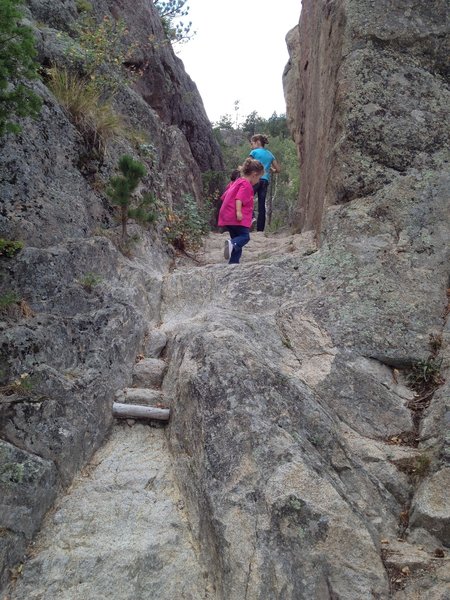 The trail follows this neat cutout through the rock.