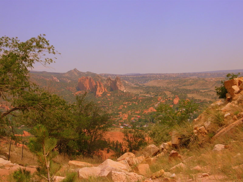 View of Garden of the Gods in the heat of a Colorado summer from Red Rock Canyon OS.