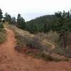 The turn on the Mesa Trail down to the steps to the stream crossing behind NCAR