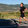 A runner crushing the road portion of the Park City Half.