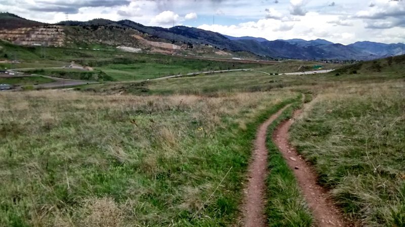The beginning of Box 'o Rox trail is doubletrack but will soon change to singletrack. You can see I-70 going up into the mountains in the background.