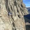 Slackliner at the top of Yosemite Falls