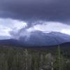 Storm rolling over Mammoth Mountain as seen in Tuolumne Meadows