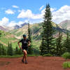 Views of Castle Peak unfold on the run up Teocalli Ridge. (photo by Shana Light)