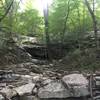 Waterfall and rock wall on the Bostick Trail. When dry you can climb up to the top of it.