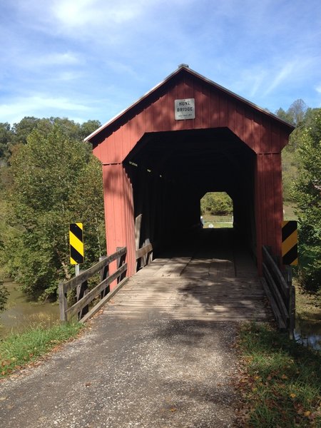 The Hune Covered Bridge is located on Smith Road/T34 just off of SR 26- you cross over it to reach the campground and Covered Bridge Trail.