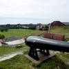 Standing on the outer ramparts, looking past one of the Parrot guns back across the inner grounds toward the boat dock.