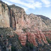 Looking back at the imposing sandstone cliffs of Oak Creek Canyon while on the North Wilson Trail.