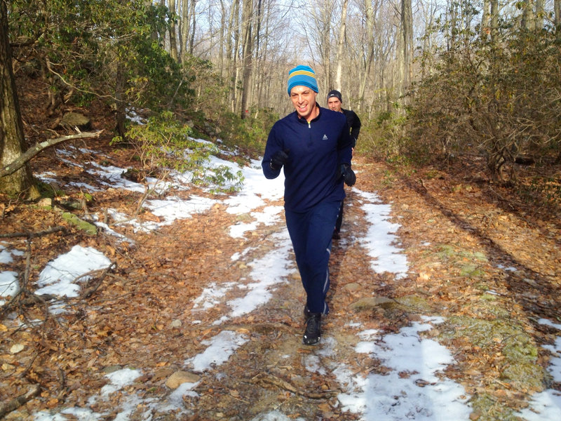 Runners on the trail in the winter.