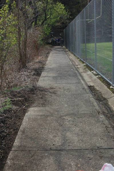 Sidewalk along the football field. The not-so-obvious trailhead.