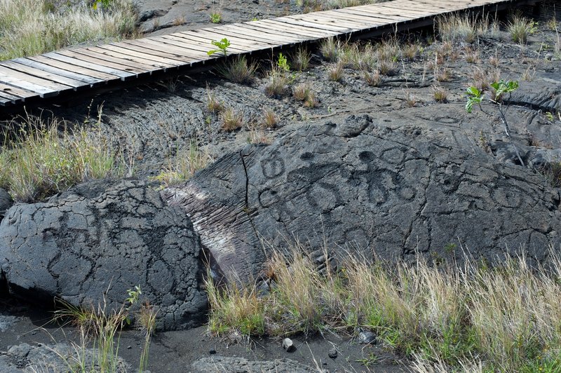 Petroglyphs etched into the lava.