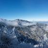 Mount LeConte after a winter storm on the AT. Clouds hug the ridges and hoarfrost covers the trees.