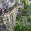 A side trail when in the Machu Picchu park goes out to the "Inca Bridge".  You can't get all the way down to the bridge, but it's a fun walk atop steep walls down to the viewing point.