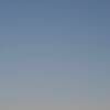 The Stanford Dish and moon at sunset.