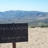 The summit of Ryan Mountain is marked by a small sign. The rest of the park stretches out before you at this point.