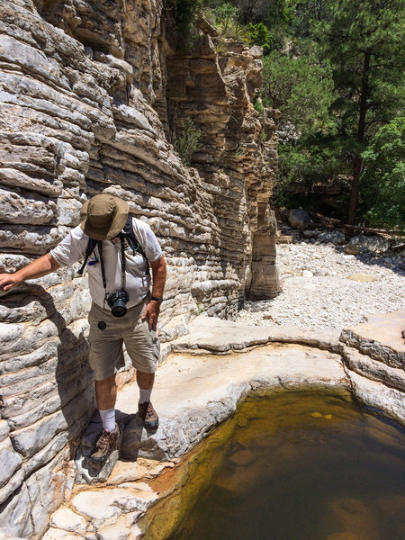 Getting around the deep pools at the top of the dried up waterfall.