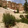 Hiking past the Wall of Windows at Bryce Canyon NP.