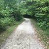 Unpaved section of trail (service road). Trail is in great shape. Easy walking/running.