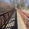A long bridge on the Lost Slough Wetlands Walk Trail.