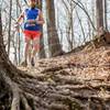 Chris O'Brien from the Running Inside Out Podcast bombing the downhills at Medved Madness Trail Run. (Photo by Ron Heerkens Jr Photography.)