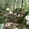 Families hike along the Blue Heron Loop Trail near the river.