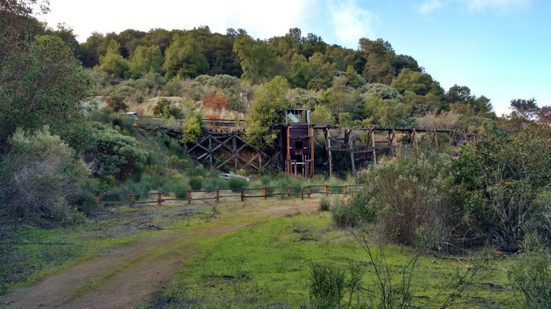 This is the view approaching the remnants of April Trestle on April Trail. Mining ore cars brought cinnabar (mercury ore) out of the April Tunnel at the left end of April Trestle.