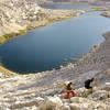 A pair of hikers climbs from the Cottonwood Lakes up Old Army Pass in Sequoia National Park.