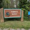 The main entrance sign for Tobico Marsh.