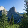 Nevada Fall, Liberty Cap and the back of Half Dome pose for a photo from the John Muir Trail in Yosemite National Park.