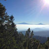 Enjoy this incredible vista showing Iztaccíhuatl and Popocatépetl as it pokes through the pines.