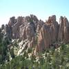 The Crags are jagged rock formations that tower around The Crags Trail.