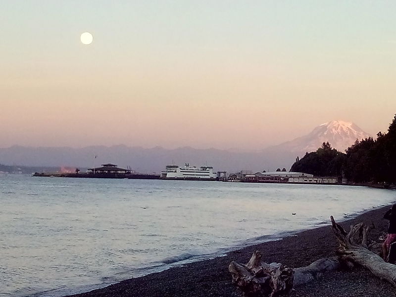 Mt. Rainier and the moon hide behind the Vashon Island Ferry and