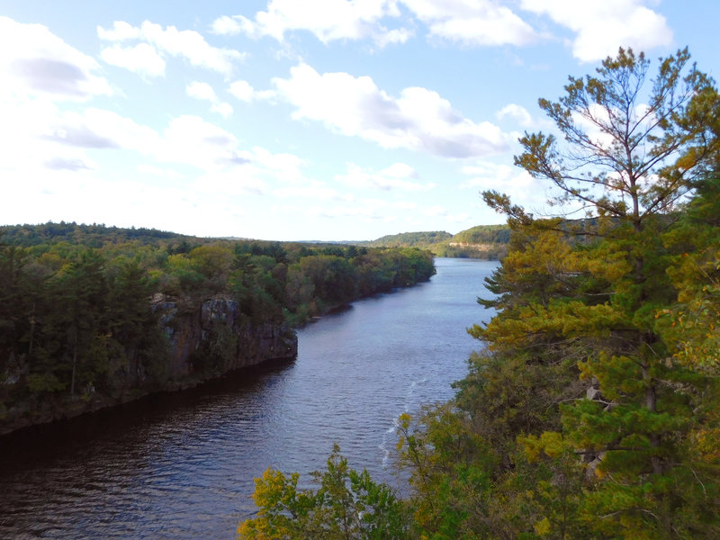 The mighty St. Croix River flows through the towering cliffs lining its