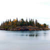 Ellingson Island holds its fall color as it floats just offshore.