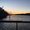 The sun sets over the Appomattox River.