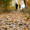 A pair enjoys a fall run at Bennington Lake.