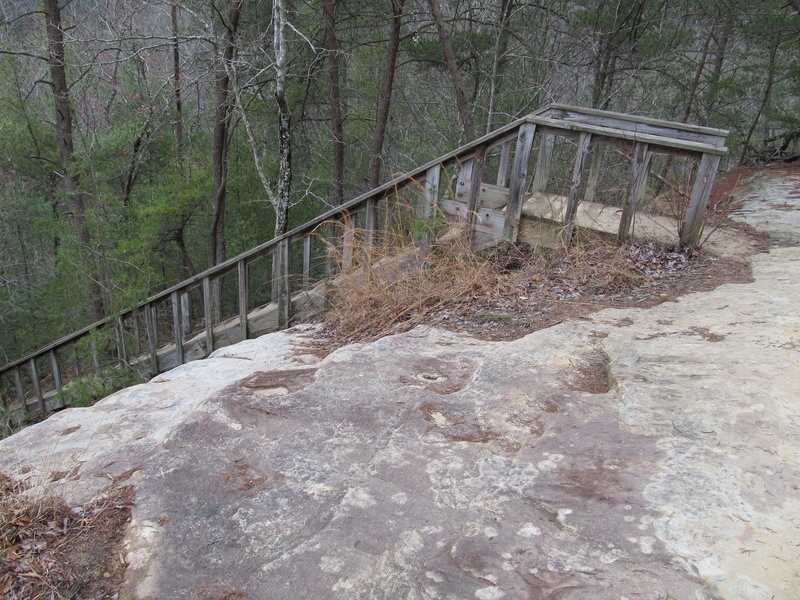 A long set of stairs helps you get down to Silvermine Arch.