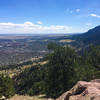 The top of Mount Sanitas looks out at the beauty of Boulder and the Flatirons.