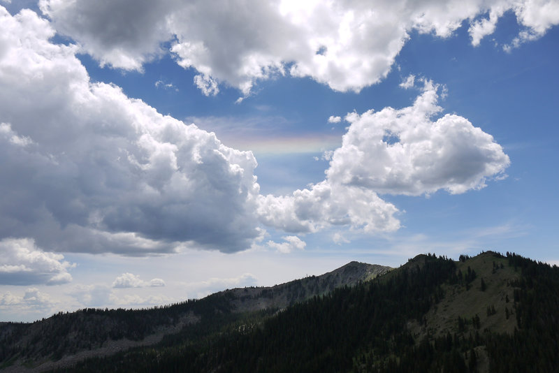 Iridescent clouds float above Clayton Peak.
