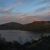 The sun sets over Lake Poway.