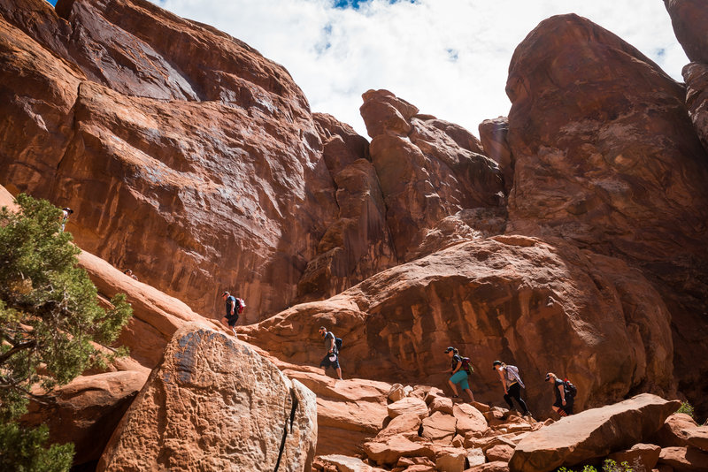 The group heads up a section of tumbled steps in the Fiery Furnace.