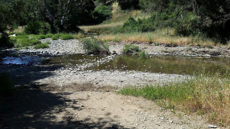 A creek crossing will test your balance along Hunting Hollow Road.