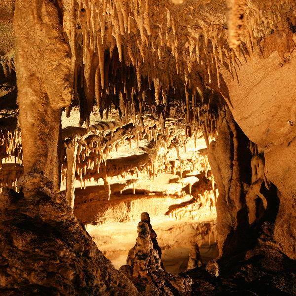 Stalactites and stalagmites make the Frozen Niagara tour a beautiful experience. Photo credit: NPS Photo.