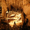 Stalactites and stalagmites make the Frozen Niagara tour a beautiful experience. Photo credit: NPS Photo.