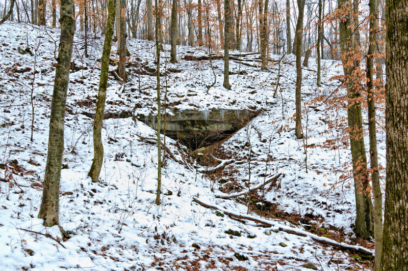 A small alcove hides under a snowy blanket along the Buffalo Creek Trail.