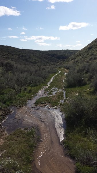 Spring runoff flows near the south end of the trail.