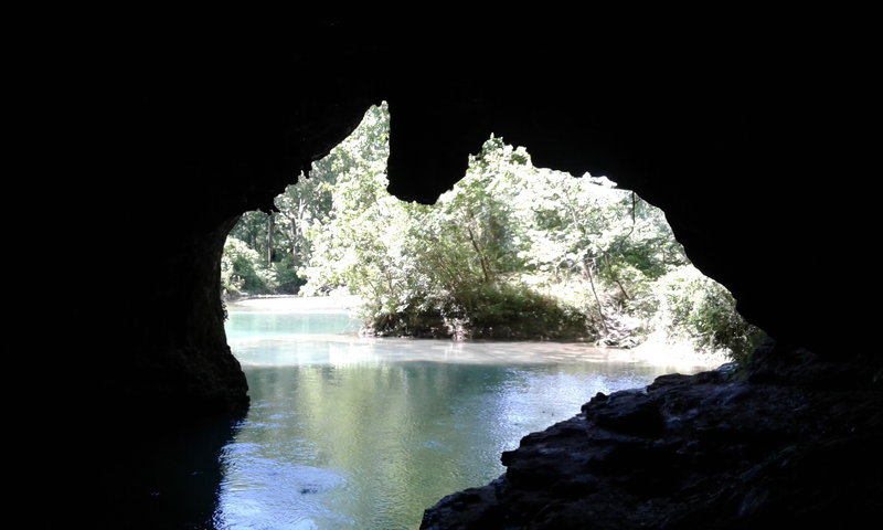 You can look out at the Current River from within Cave Spring.