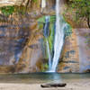 Lower Calf Creek Falls and its impressive colorful alcove.